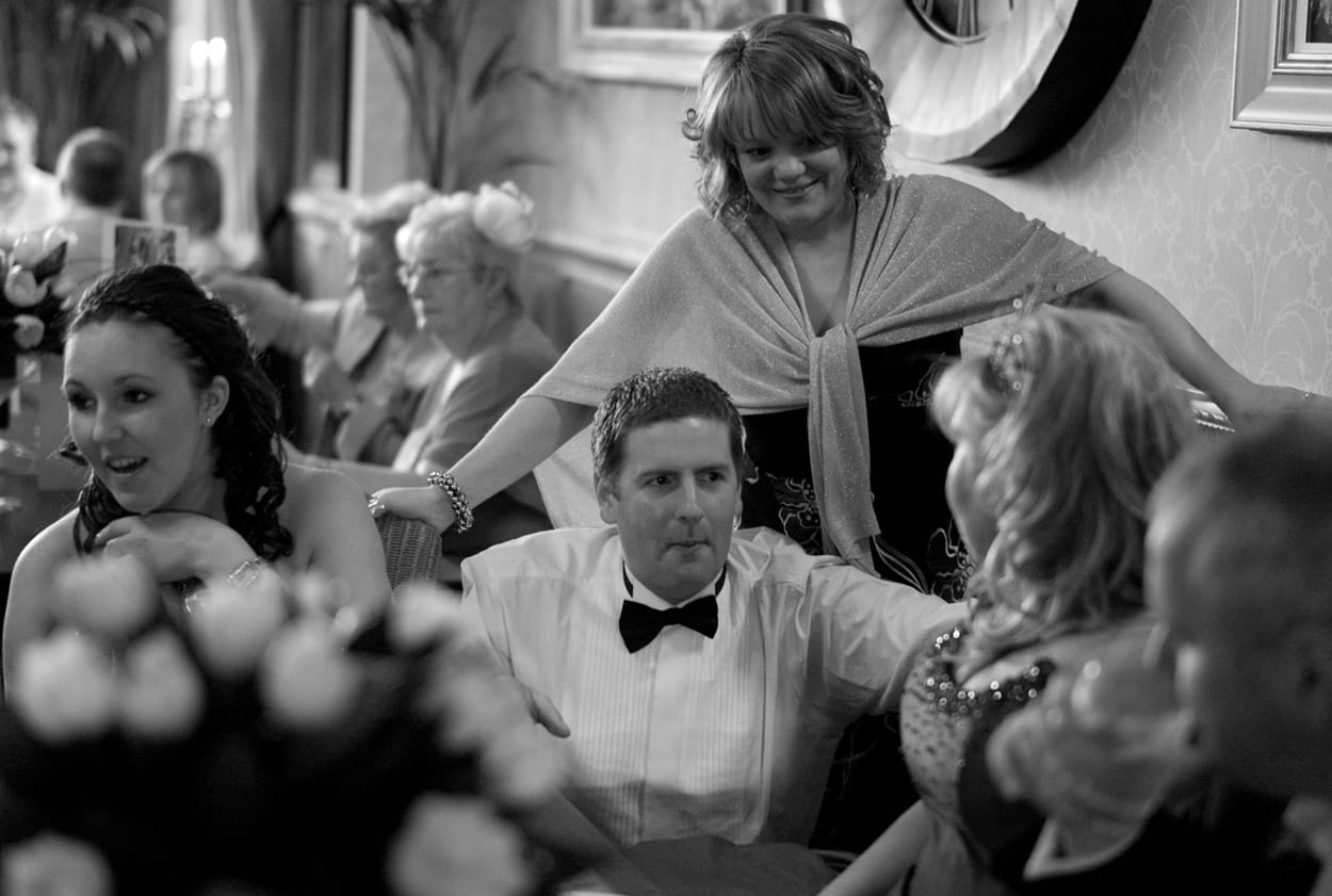 Black and white candid showing raw emotion during the speeches.