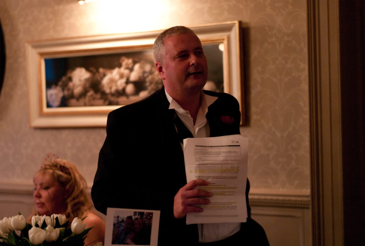 The groom delivering his speech with heartfelt emotion.