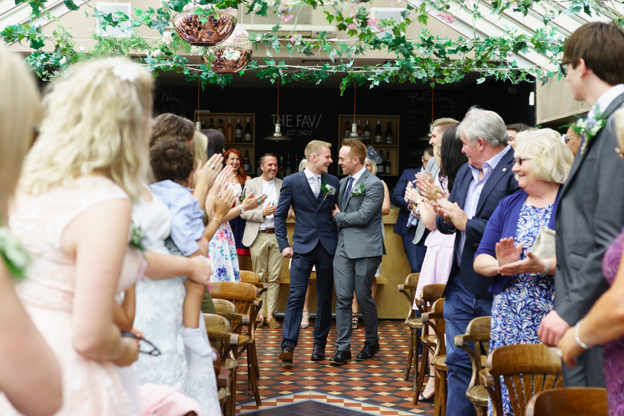 Entrance of the Grooms for their wedding ceremony at the faversham
