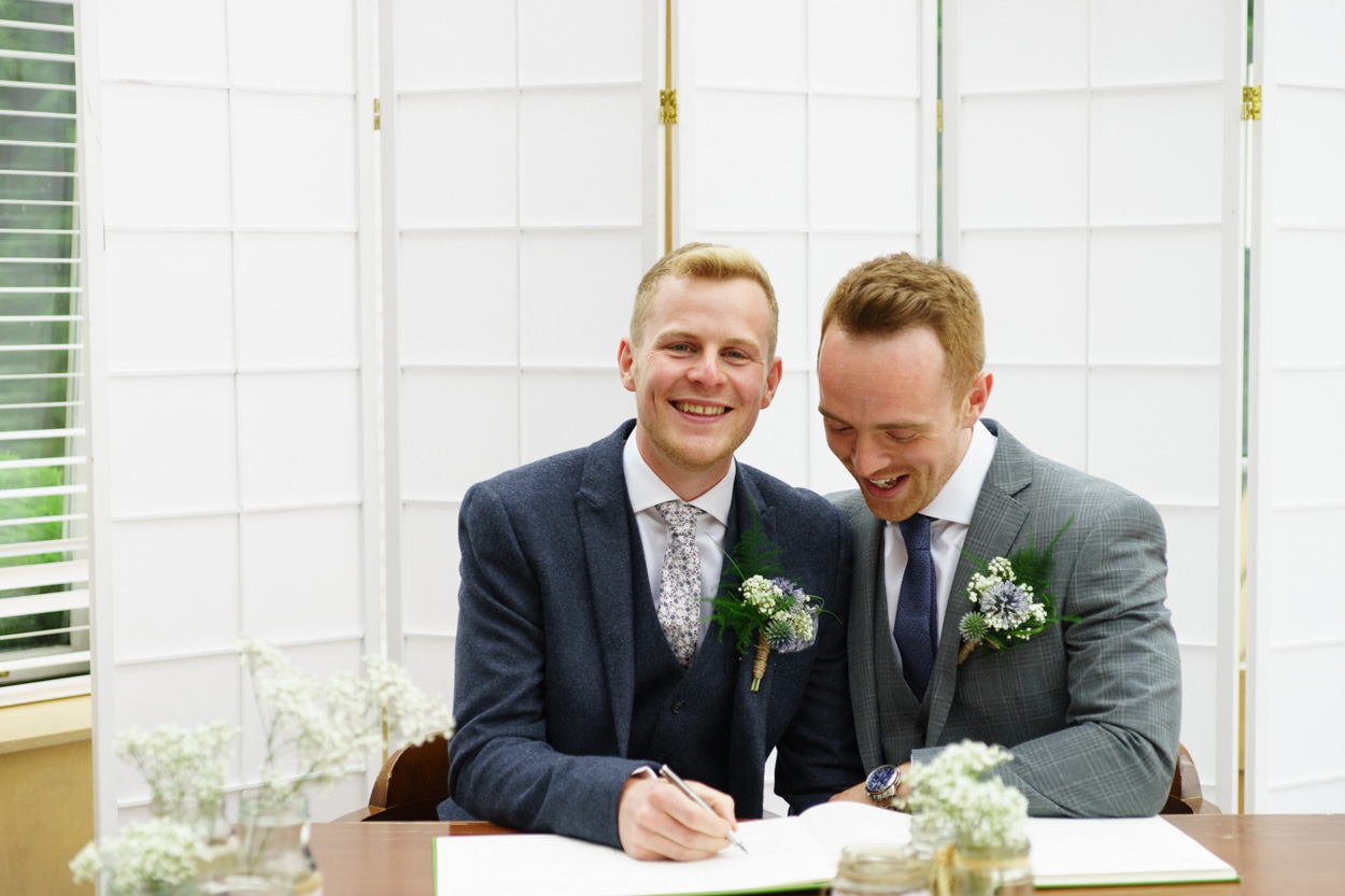 Signing the wedding register at THE FAVERSHAM LEEDS!