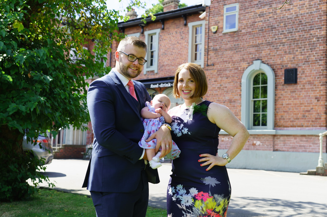 A family with their new baby outside the Faversham
