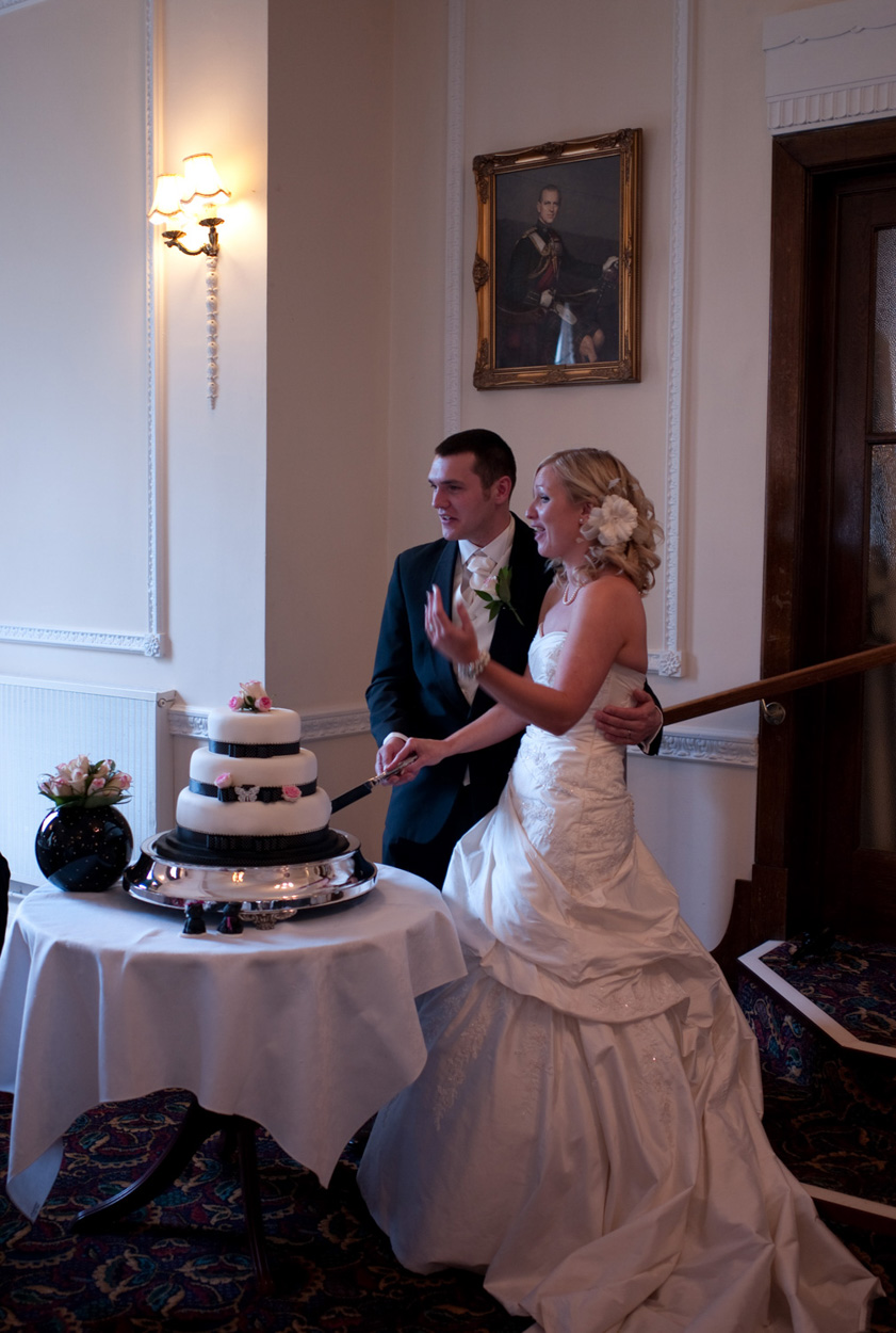 Cutting the cake - the happy couple
