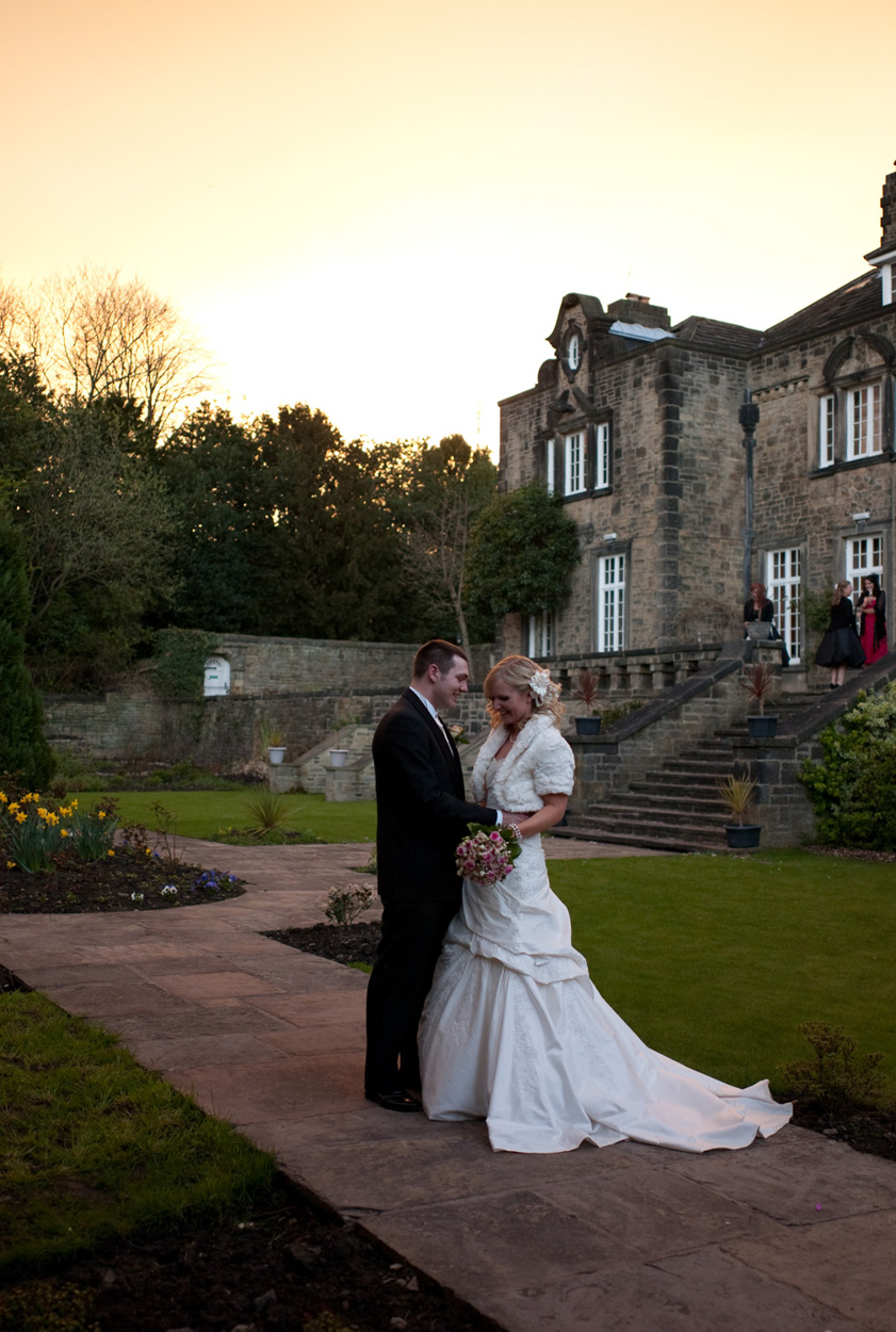 Sunset couple portrais in orange light at Hoyle Court, Baildon