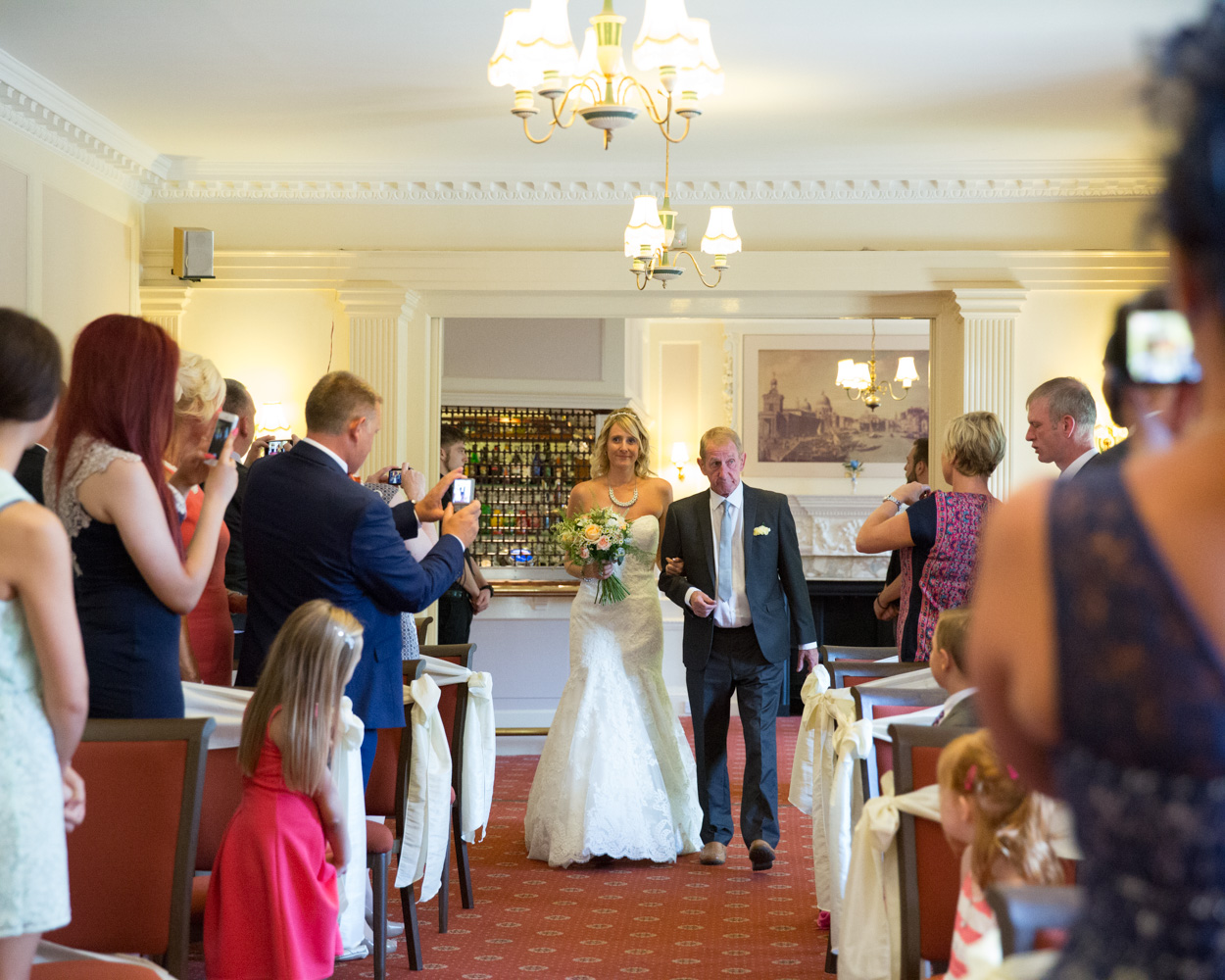 The wedding ceremony begins at Hoyle Court Baildon
