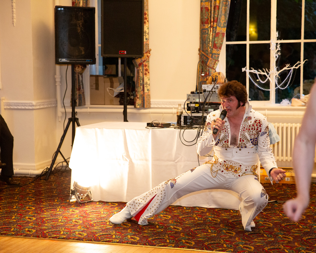 Elvis rocks the evening reception as the celebrations near conclusion