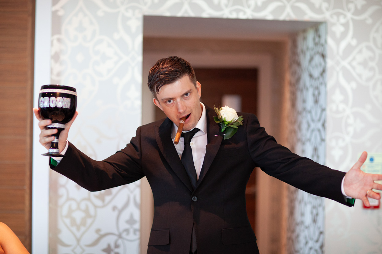 Guests in conversation about the speech competition, smiling with anticipation.