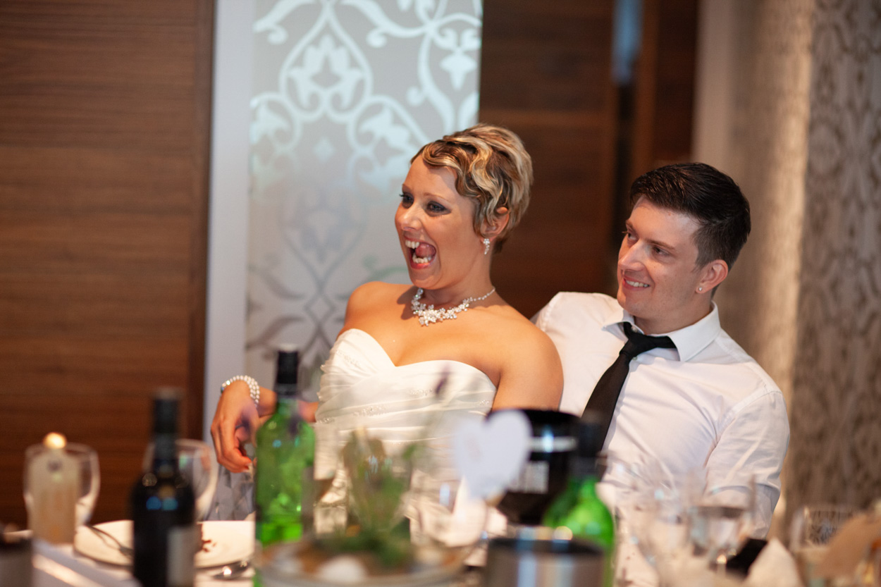 Tim begins his own speech to Sam’s delight, her face lighting up with joy.