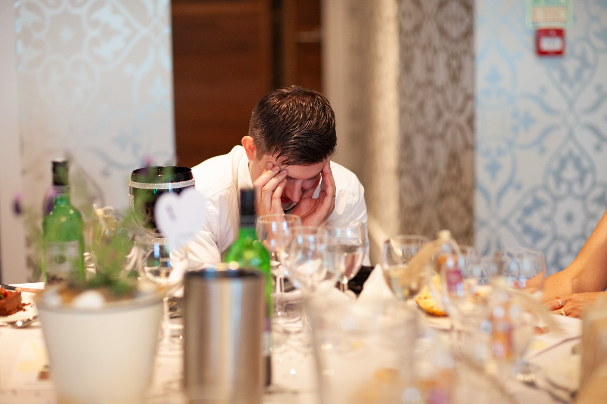 Sam playfully covers her father’s ears as the stories take a cheeky turn.