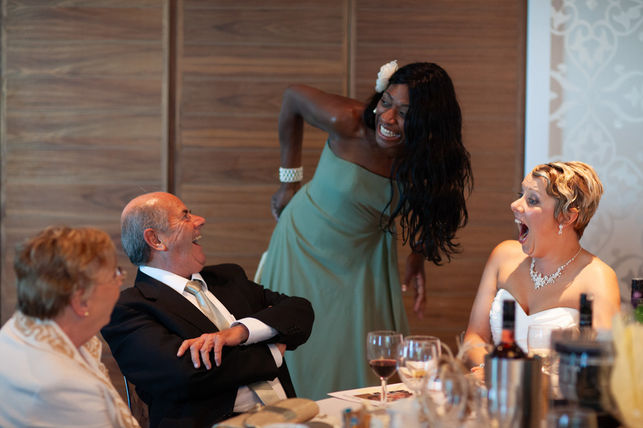 A guest announces the speech timing results to a curious crowd.