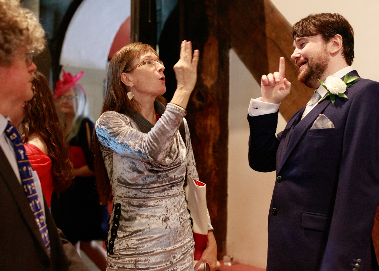 Groom and guests having fun Merchant Adventurers Hall
