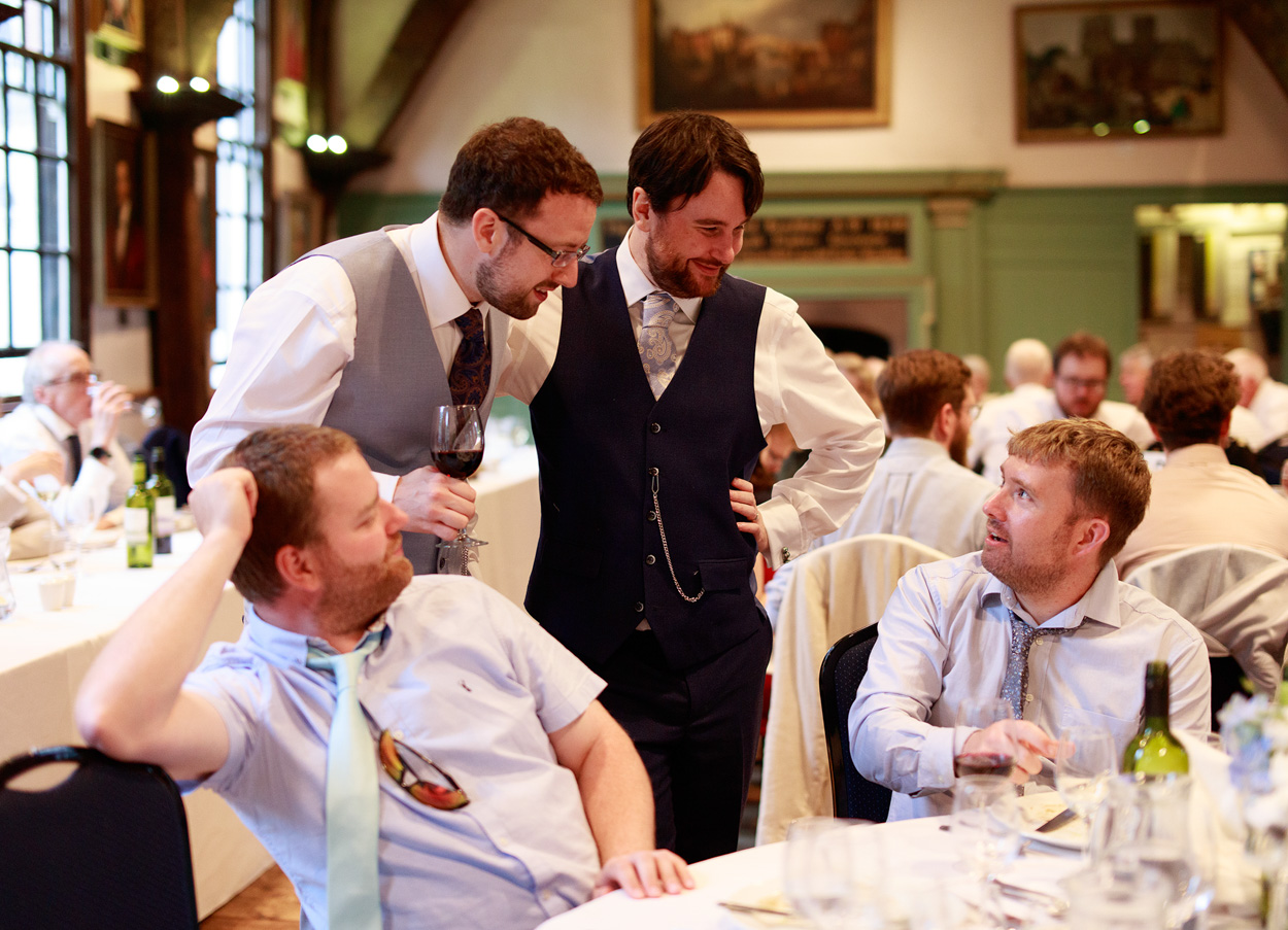 Grooms greet their guests at their tables