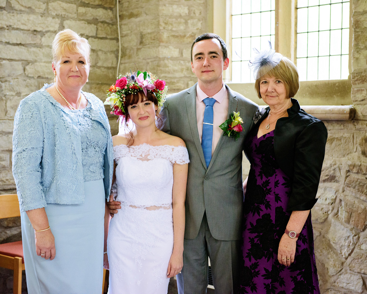 Portrait of the newlyweds under the stone arch outside St Paul’s Church, Armitage Bridge.