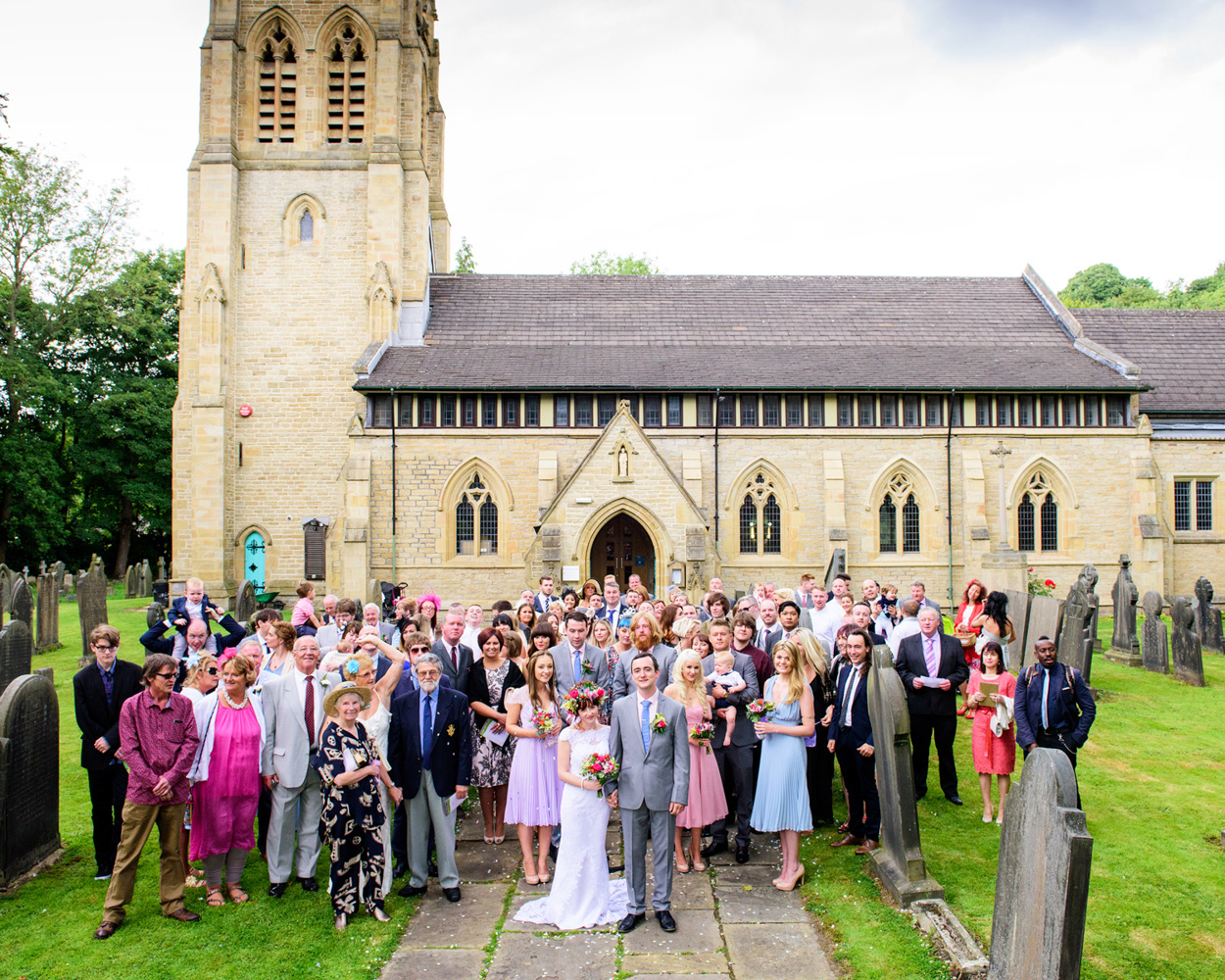 Two girls pose in a ‘love’ selfie frame at the garden reception field.