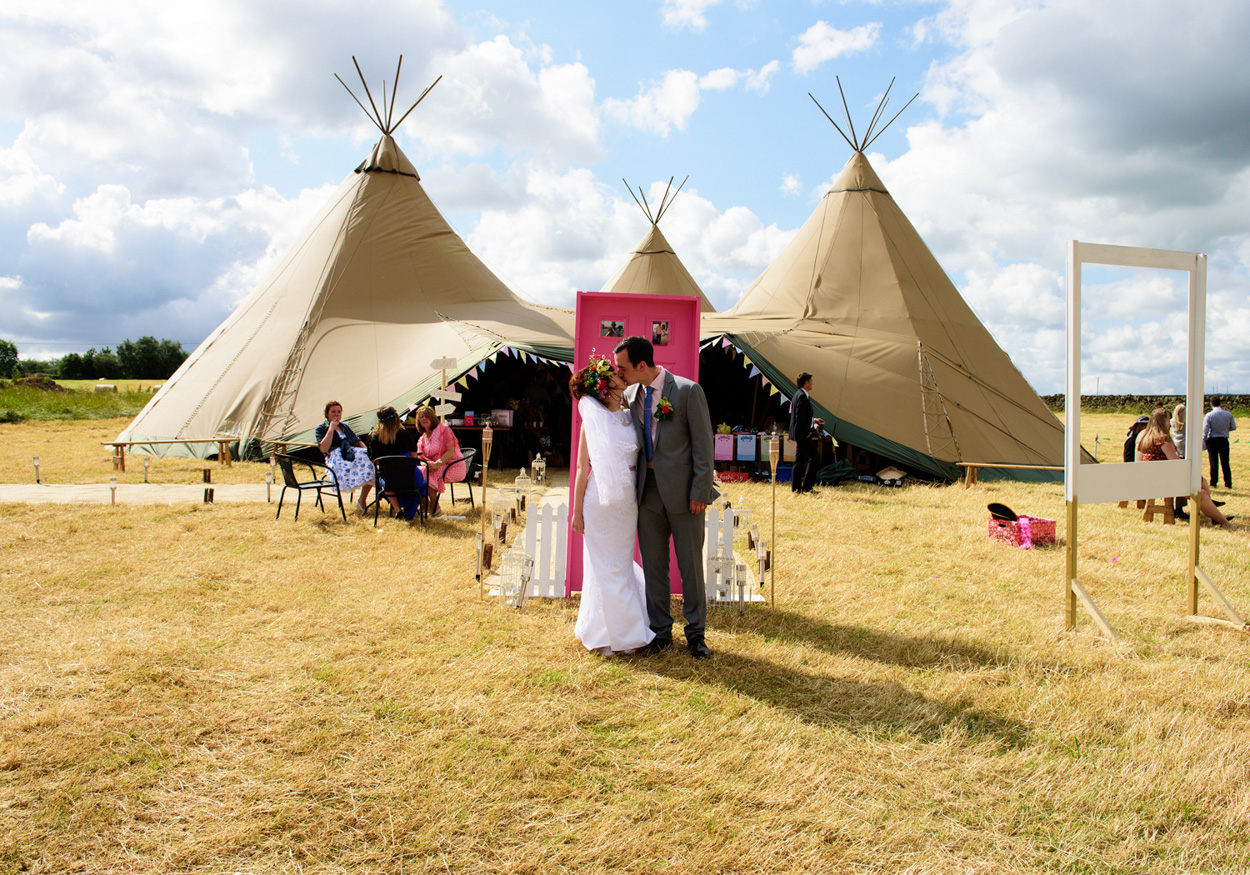 Wedding guest outside wearing bunny ears during the celebration.