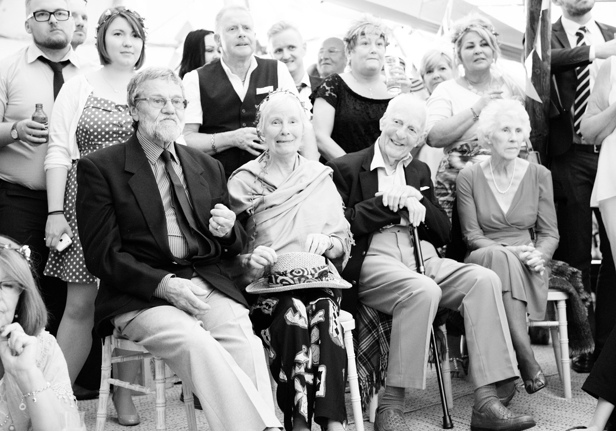 Heart shape carved into a book’s pages beside a painted “Mr & Mrs Hoey” bottle.