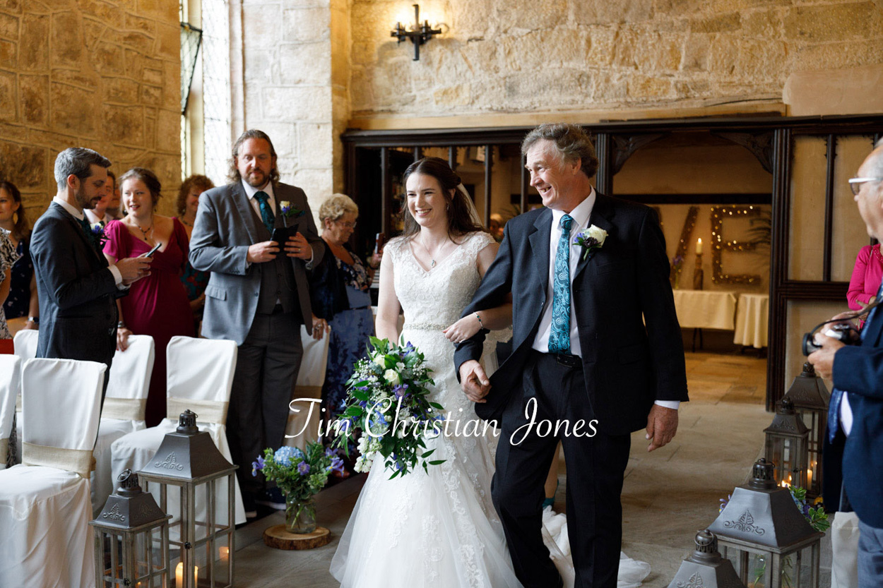 Bride and her father entrance happy smiles