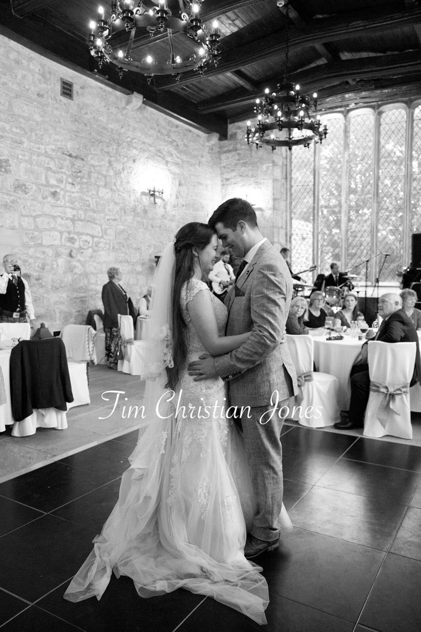 The first dance - the bride and groom on the dance floor at the Priests House, Skipton, Yorkshire Dales on a rainy summer evening
