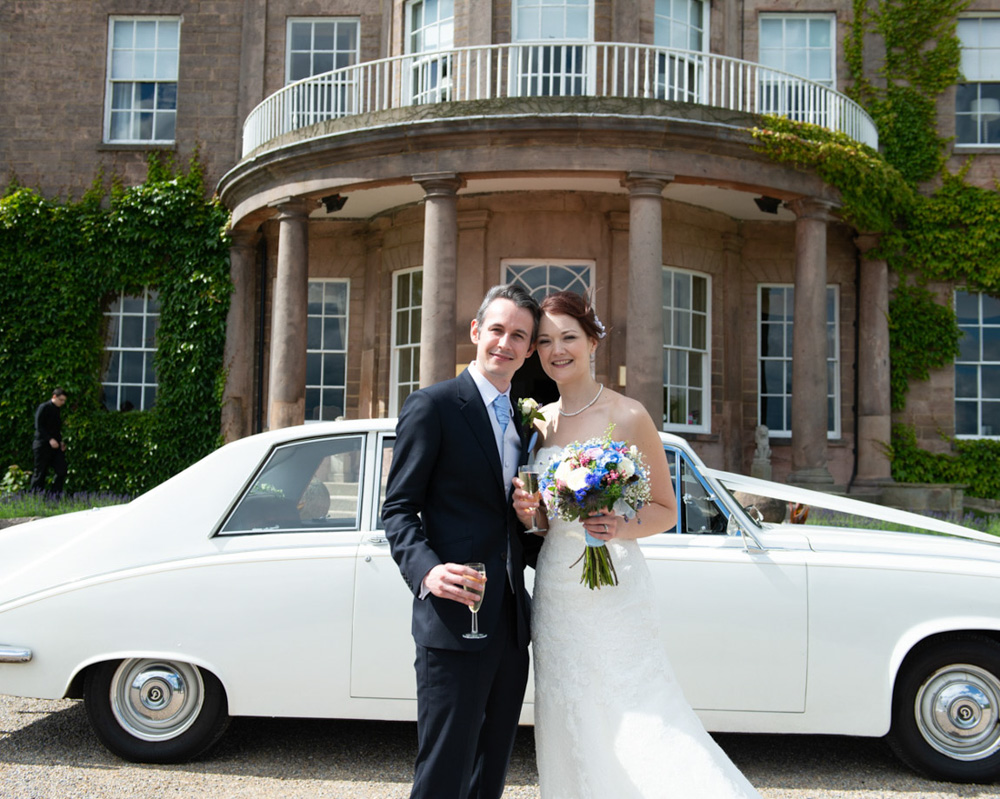 A late-June wedding at Wood Hall Hotel in Wetherby, West Yorkshire — mid-summer light, an emotive ceremony with blues and whites, sunshine smiles, heartfelt speeches, and a soft jazz band. Photographed by Tim Christian Jones.
