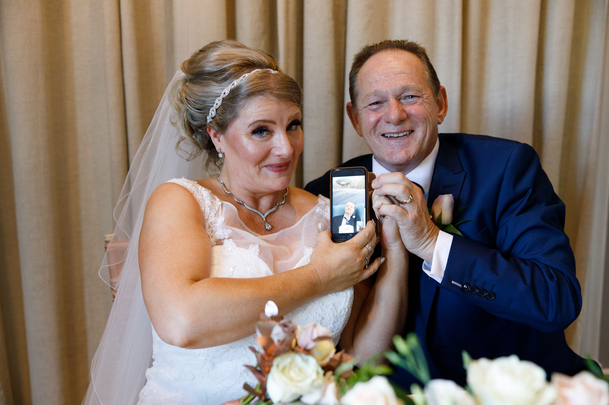 Grandad on Skype for a photo with the couple