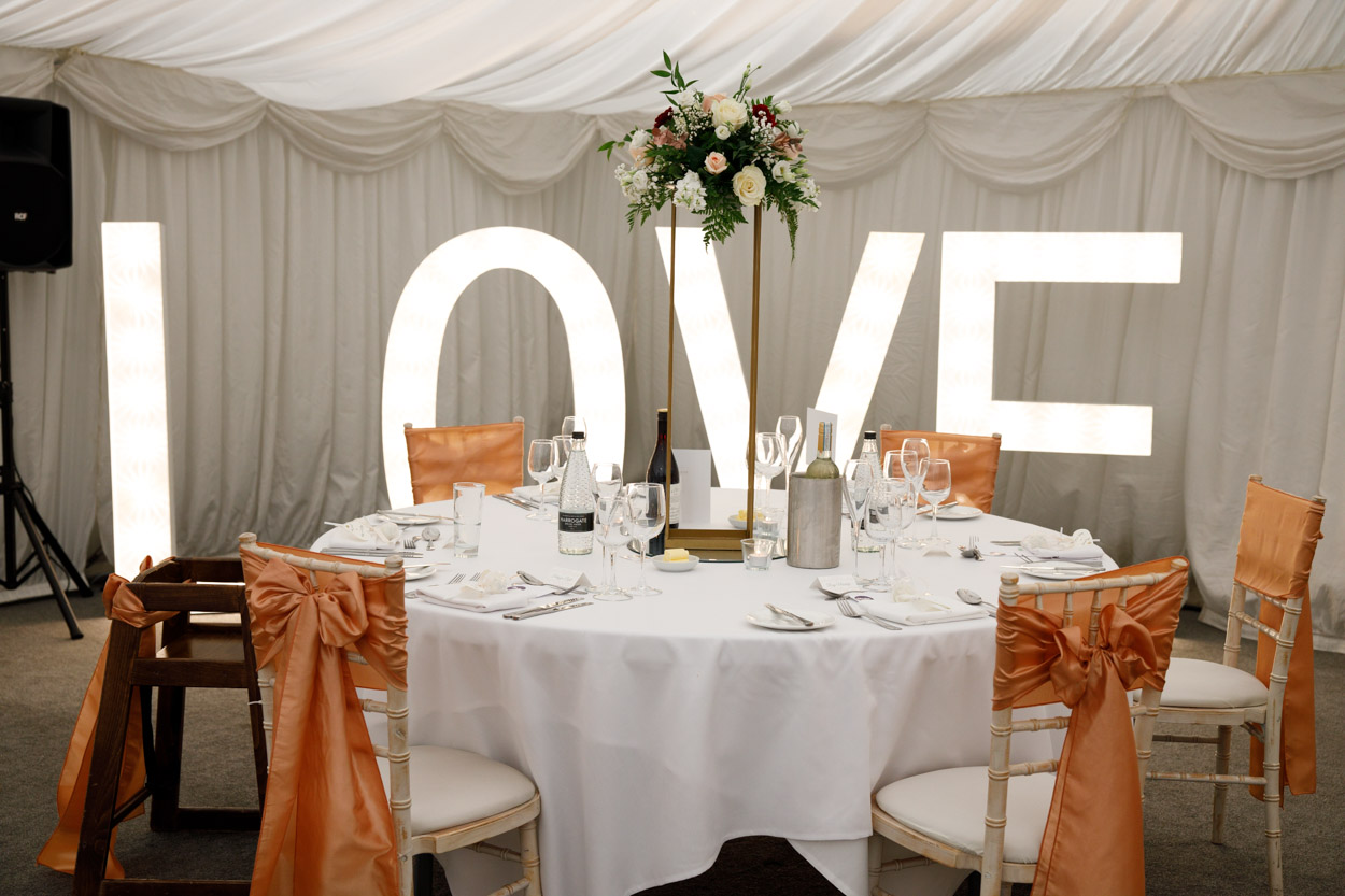 LOVE sign in the wedding breakfast marquee at the Woodlands Hotel